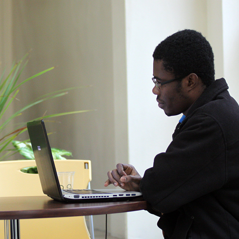 Student studying - Regis College